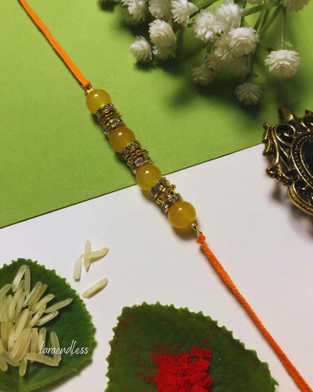 Golden Aura Rakhi in Multiple Colors – Handmade Pearl Rakhi for Raksha Bandhan