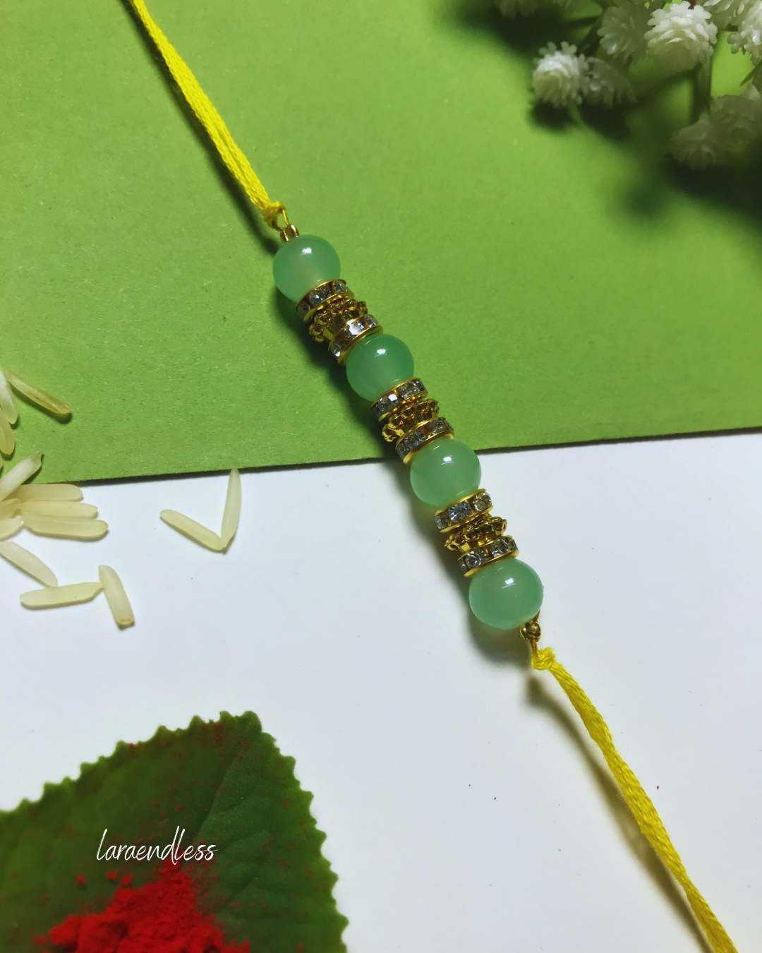 Golden Aura Rakhi in Multiple Colors – Handmade Pearl Rakhi for Raksha Bandhan