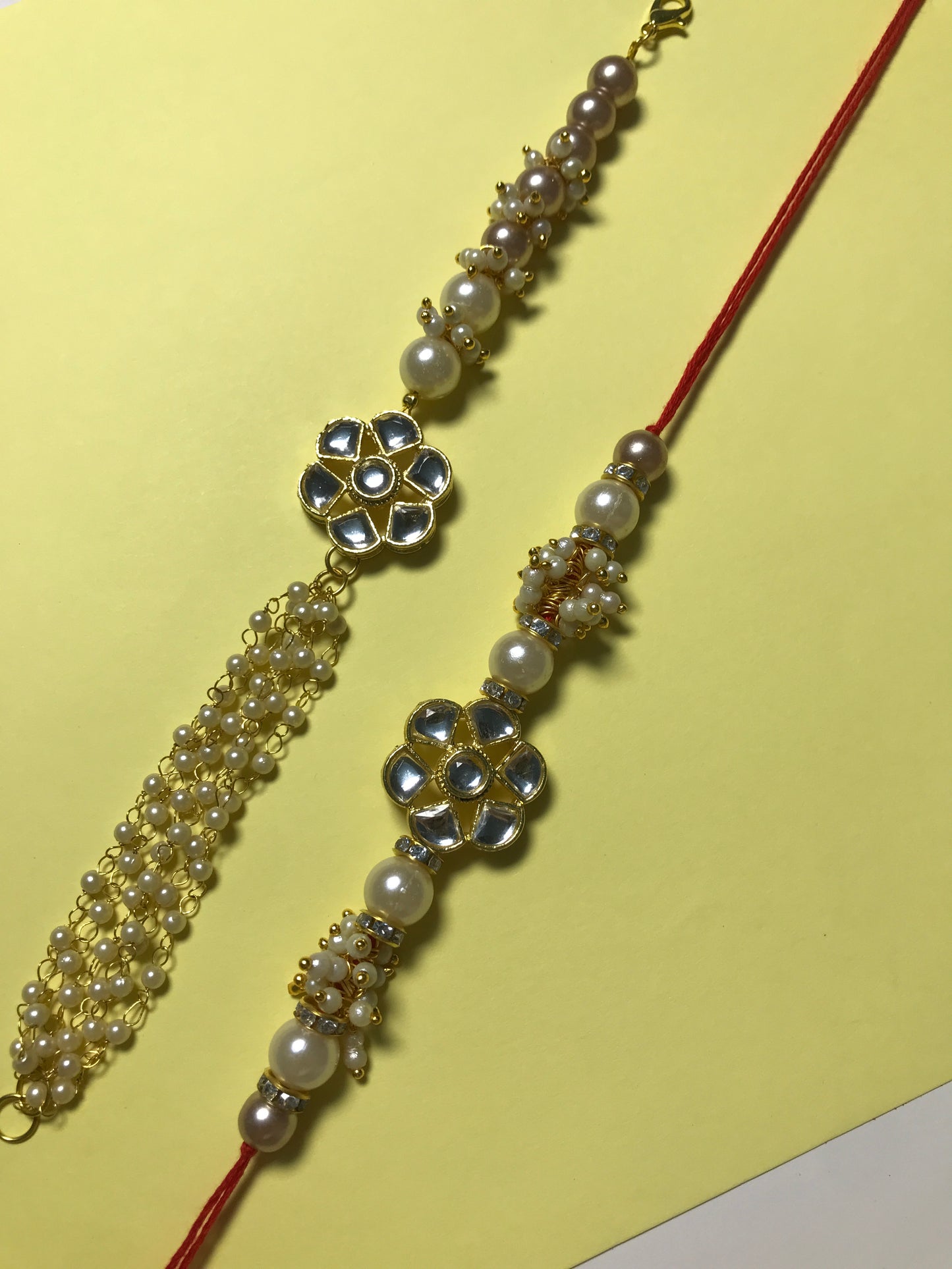 Ritika – Handcrafted Pearl Kundan Rakhi Set