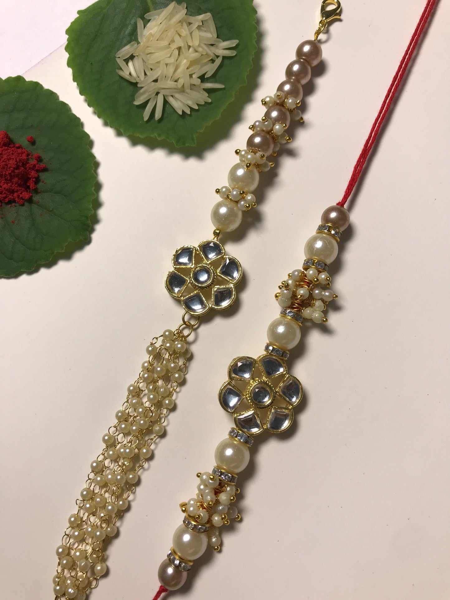 Ritika – Handcrafted Pearl Kundan Rakhi Set