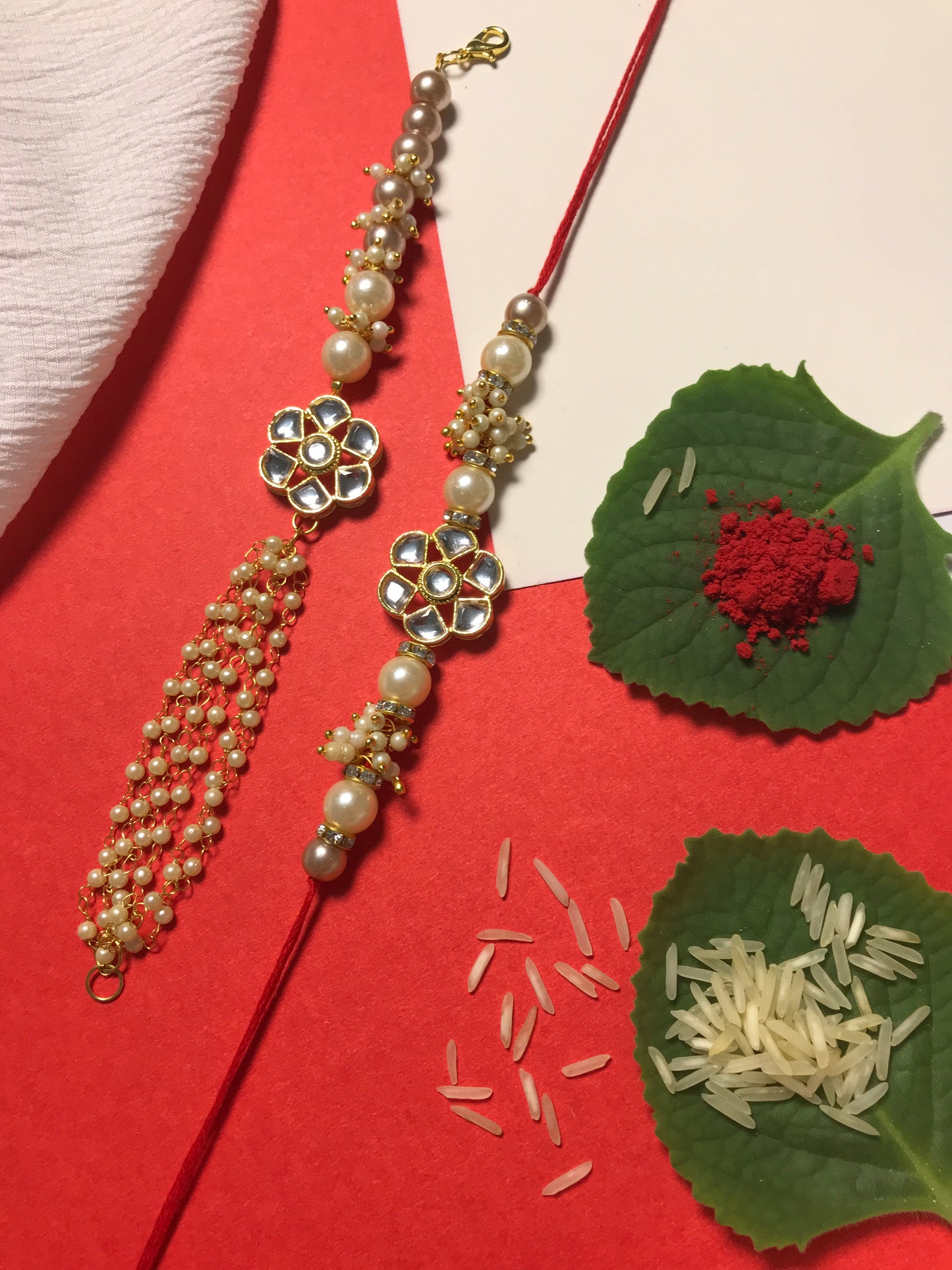 Ritika – Handcrafted Pearl Kundan Rakhi Set