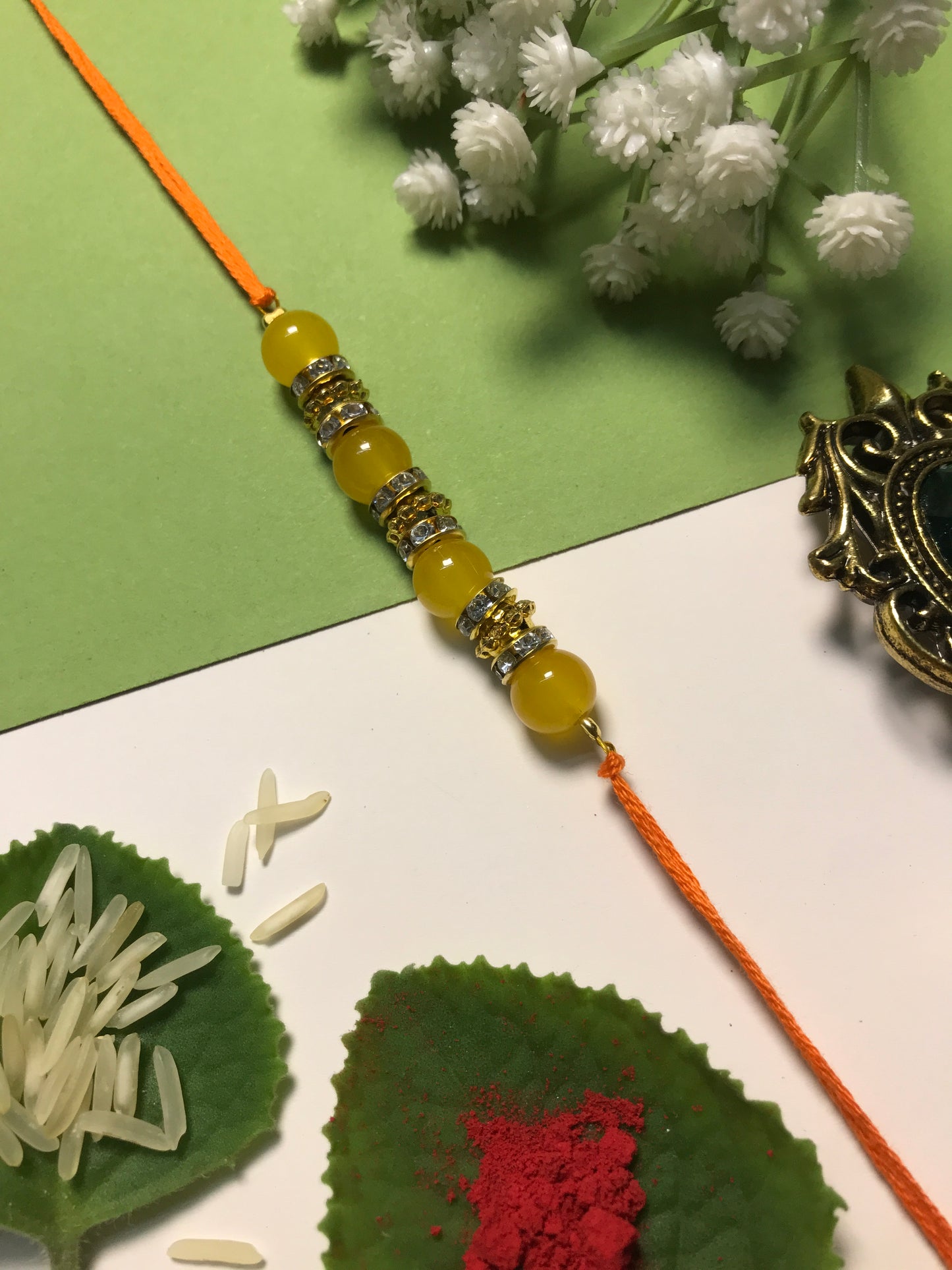 Golden Aura Rakhi in Multiple Colors – Handmade Pearl Rakhi for Raksha Bandhan