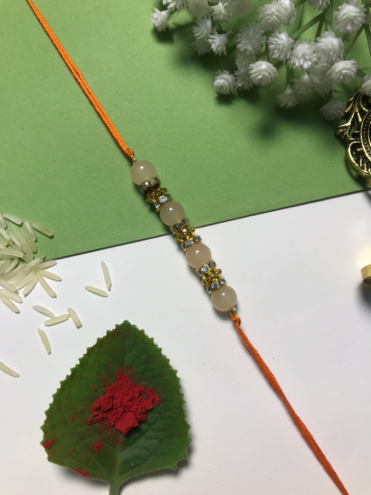 Golden Aura Rakhi in Multiple Colors – Handmade Pearl Rakhi for Raksha Bandhan