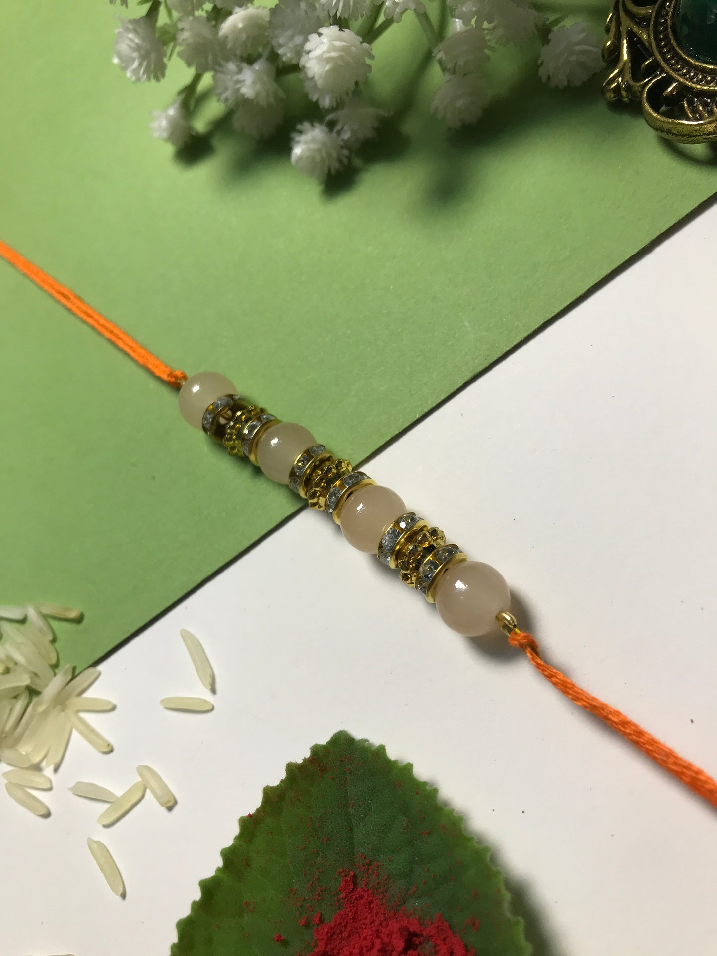 Golden Aura Rakhi in Multiple Colors – Handmade Pearl Rakhi for Raksha Bandhan