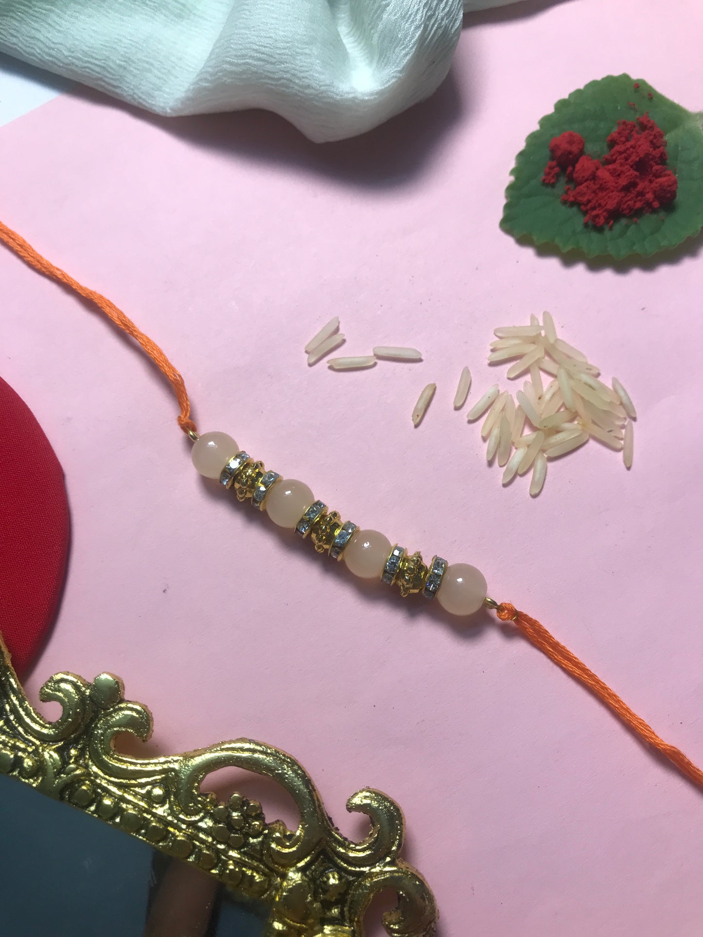 Golden Aura Rakhi in Multiple Colors – Handmade Pearl Rakhi for Raksha Bandhan