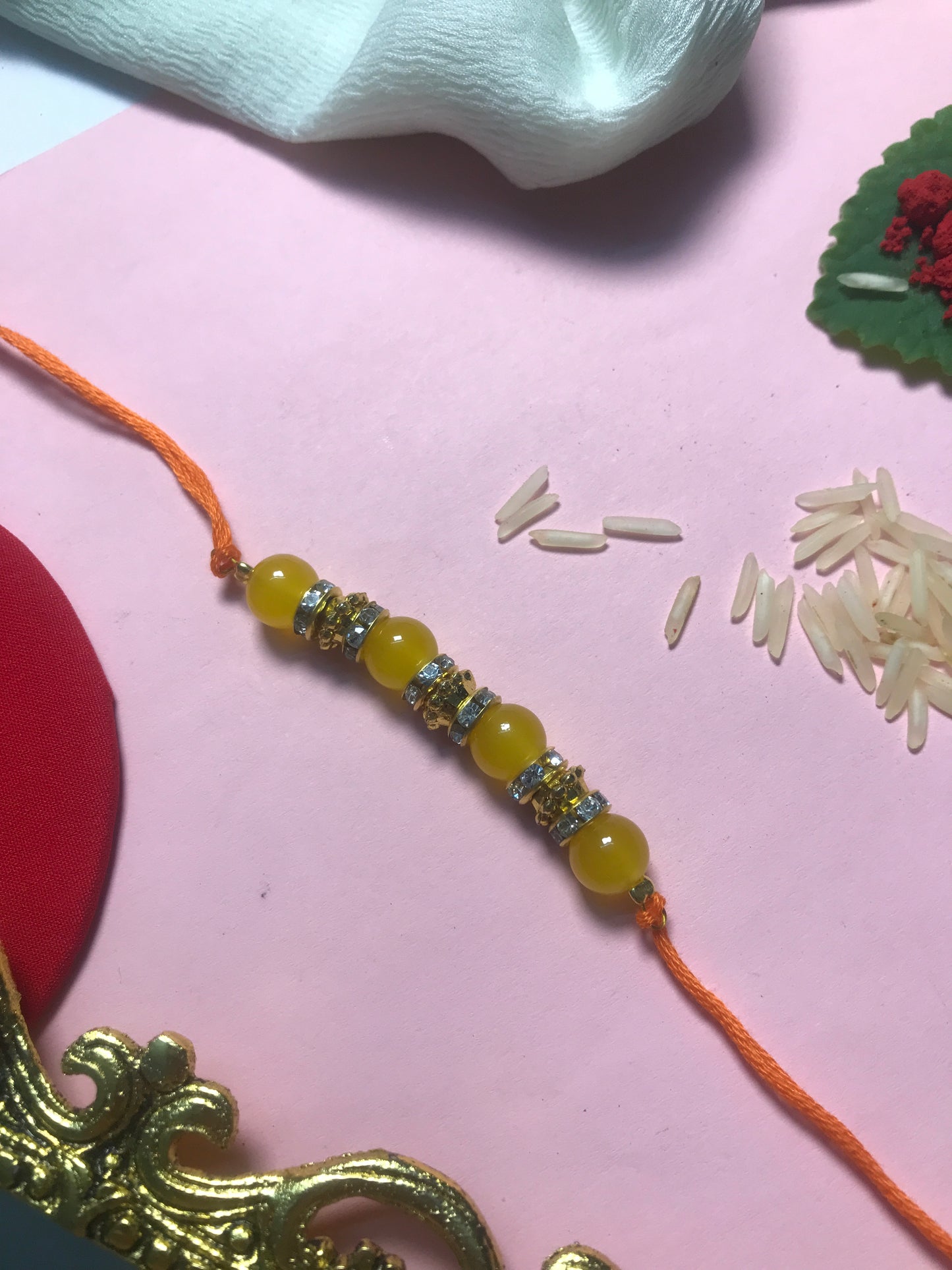 Golden Aura Rakhi in Multiple Colors – Handmade Pearl Rakhi for Raksha Bandhan