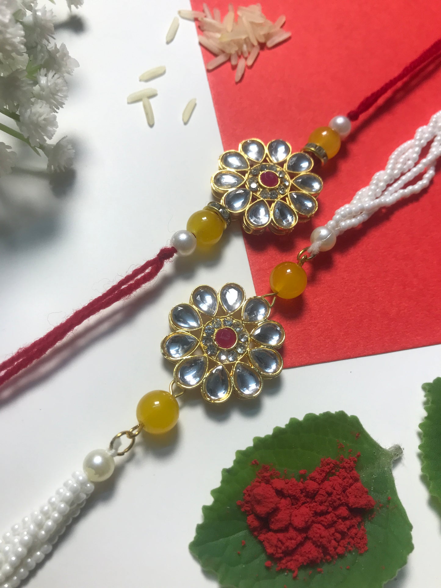 Classic Kundan Rakhi for Brother – Handmade Designer Rakhi with Pearl Chain & Yellow Beads