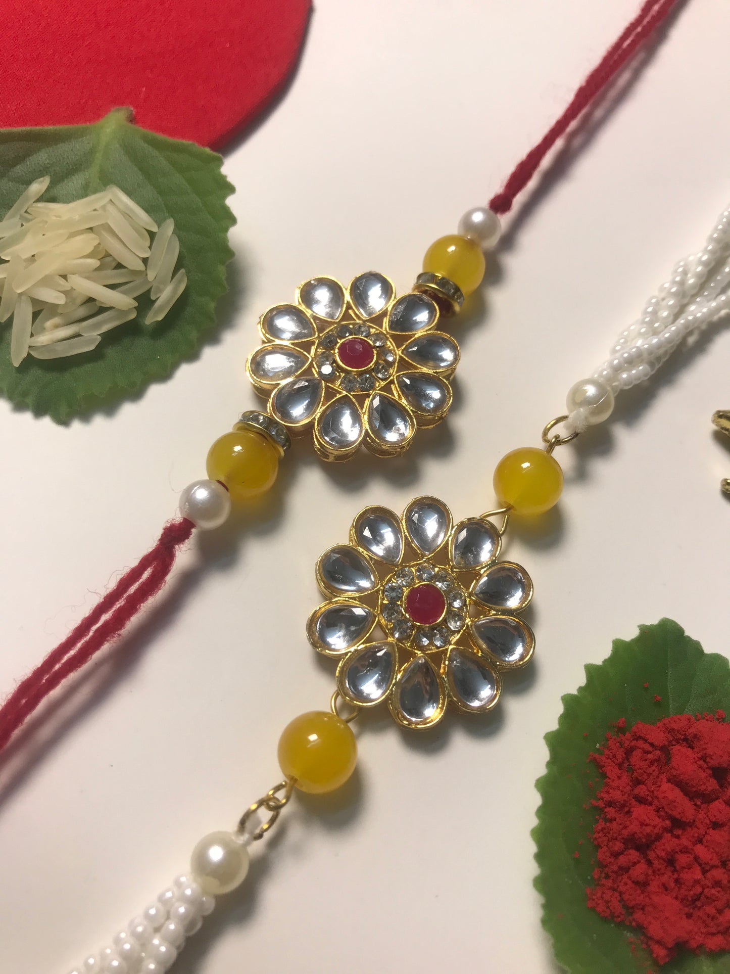 Classic Kundan Rakhi for Brother – Handmade Designer Rakhi with Pearl Chain & Yellow Beads