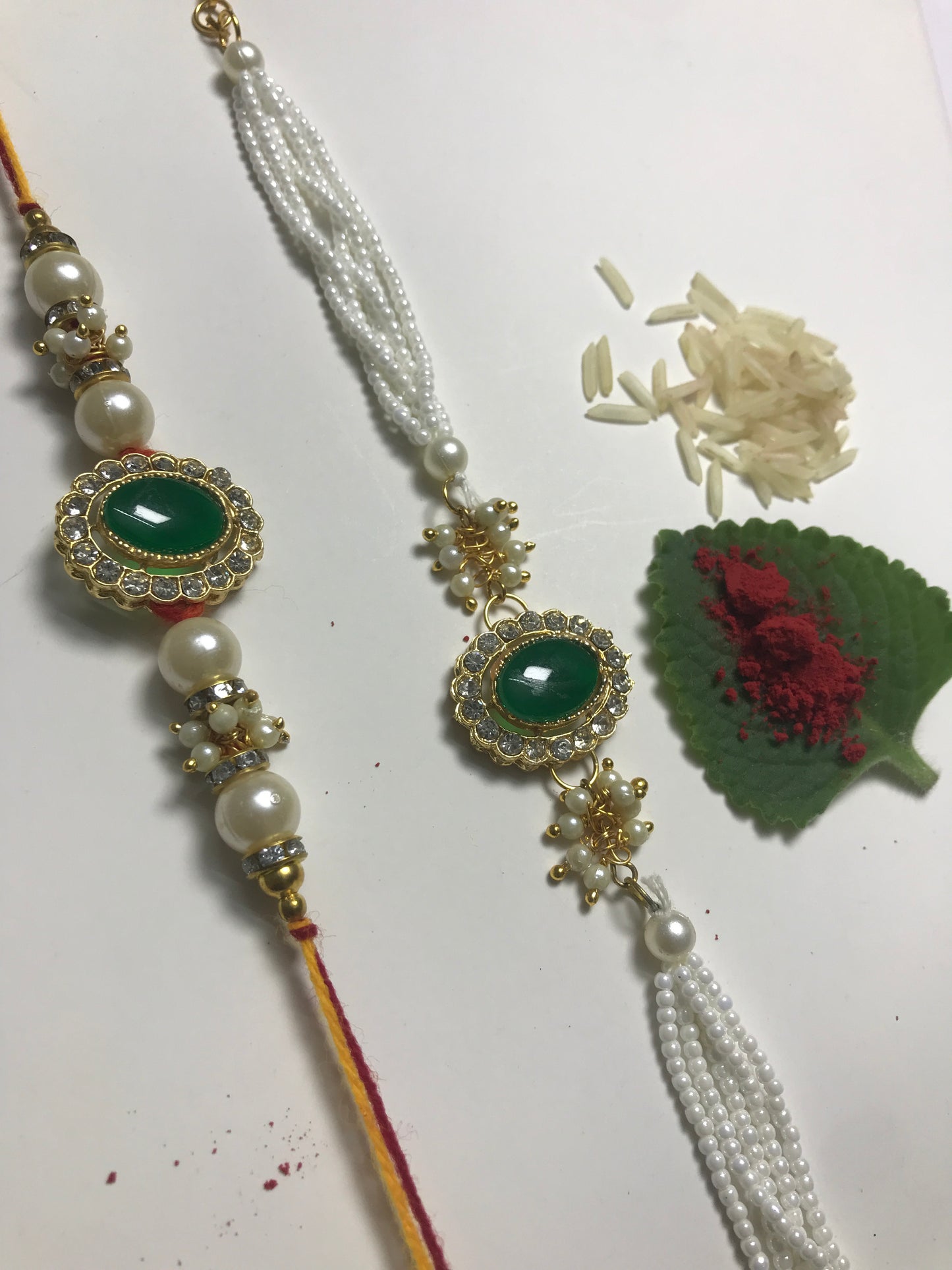 Designer Green Stone Pearl Rakhi Online – Handmade Traditional Rakhi for Brother Raksha Bandhan