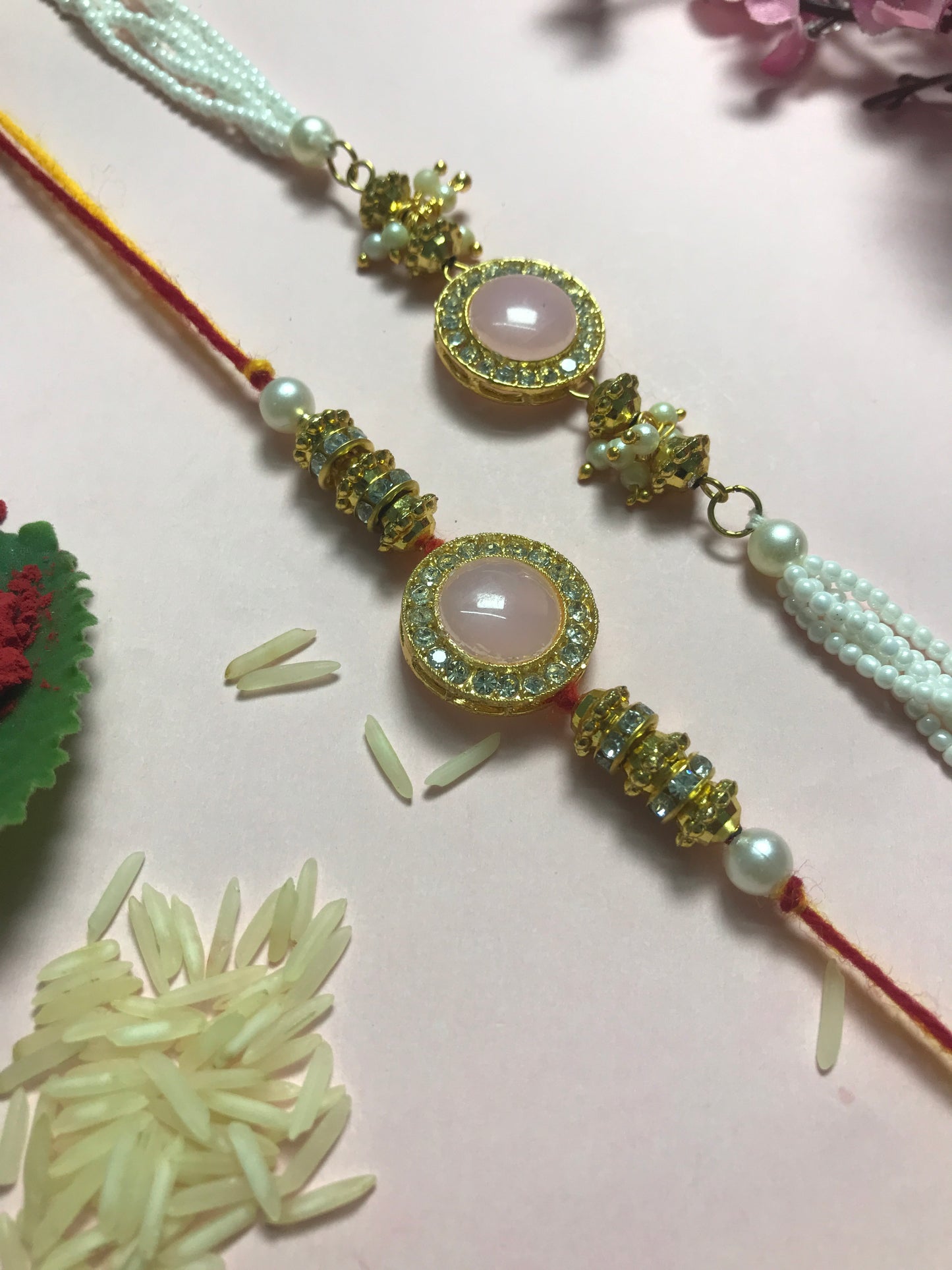 Pink Stone Pearl Rakhi – Handmade Traditional Rakhi for Brother Raksha Bandhan