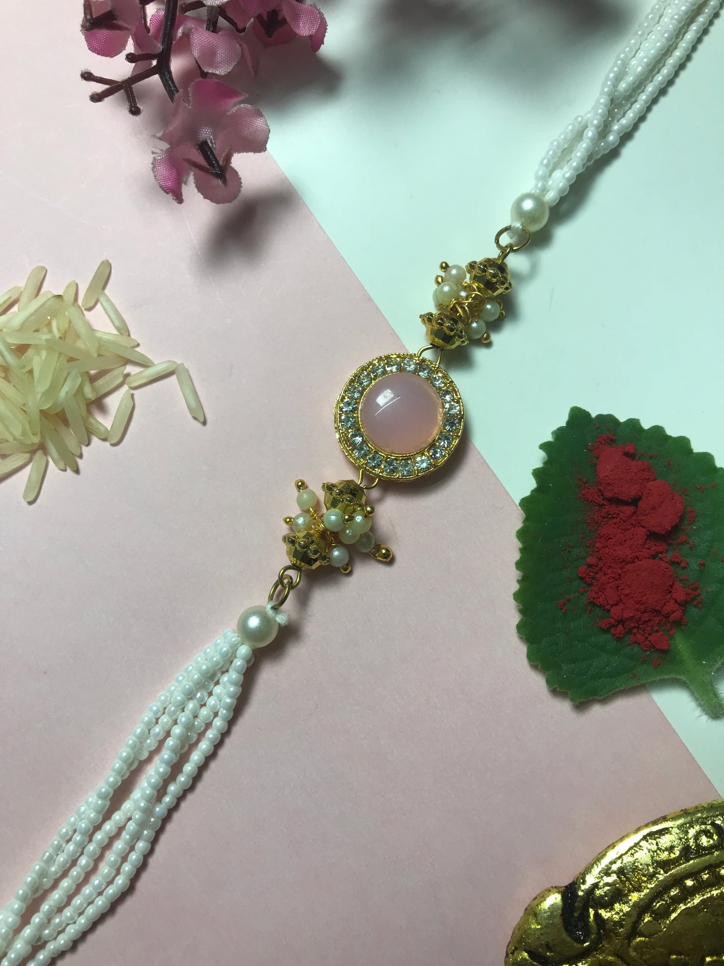 Pink Stone Pearl Rakhi – Handmade Traditional Rakhi for Brother Raksha Bandhan