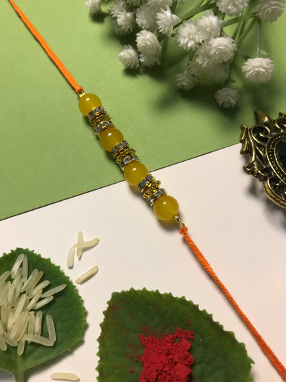 Golden Aura Rakhi in Multiple Colors – Handmade Pearl Rakhi for Raksha Bandhan