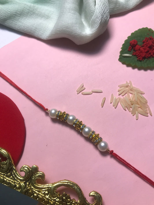 Golden Aura Rakhi in Multiple Colors – Handmade Pearl Rakhi for Raksha Bandhan