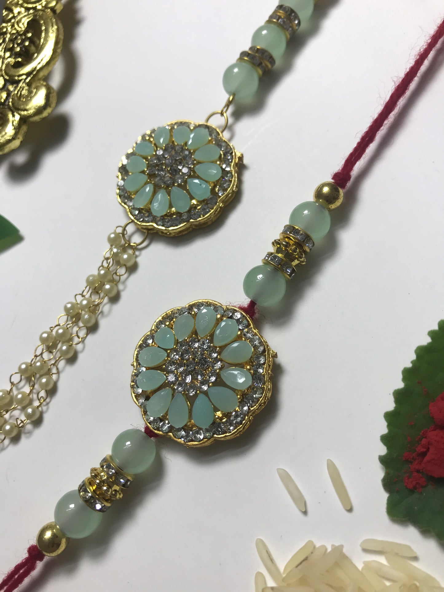 Handcrafted Mint Green Floral Rakhi – Premium Pearl Designer Rakhi for Brother